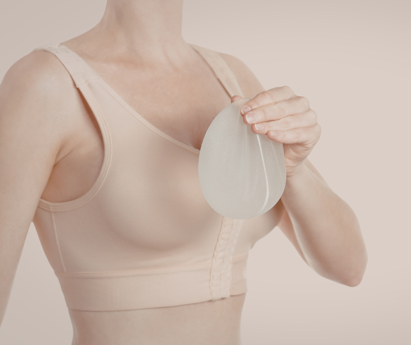 Mastopexy with breast implants at Elegance Clinic Surat